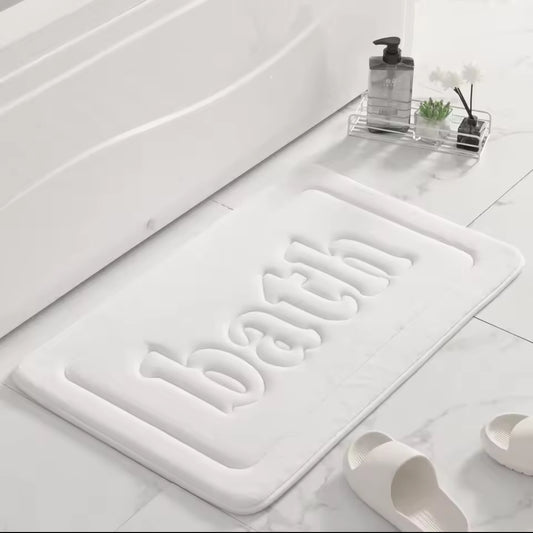 Absorbent bath mat
