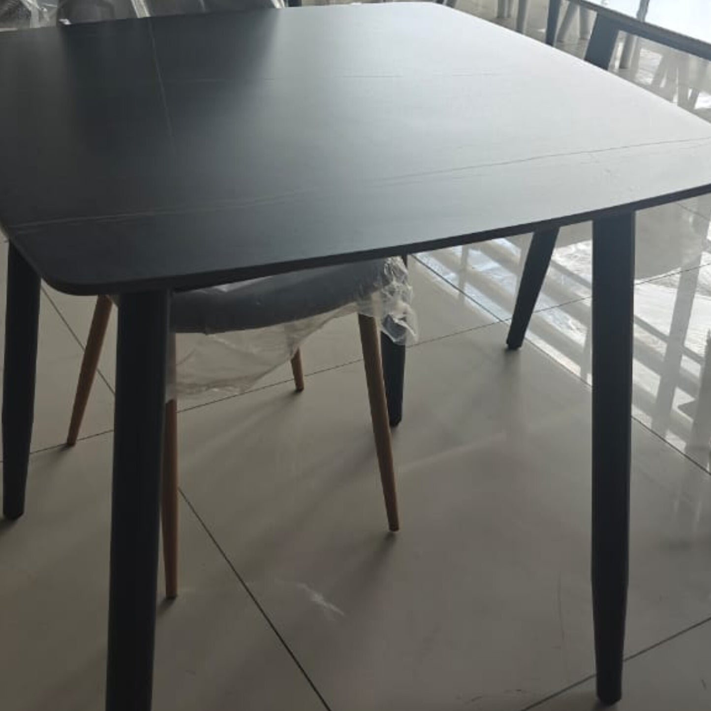 Marble table top with metallic legs