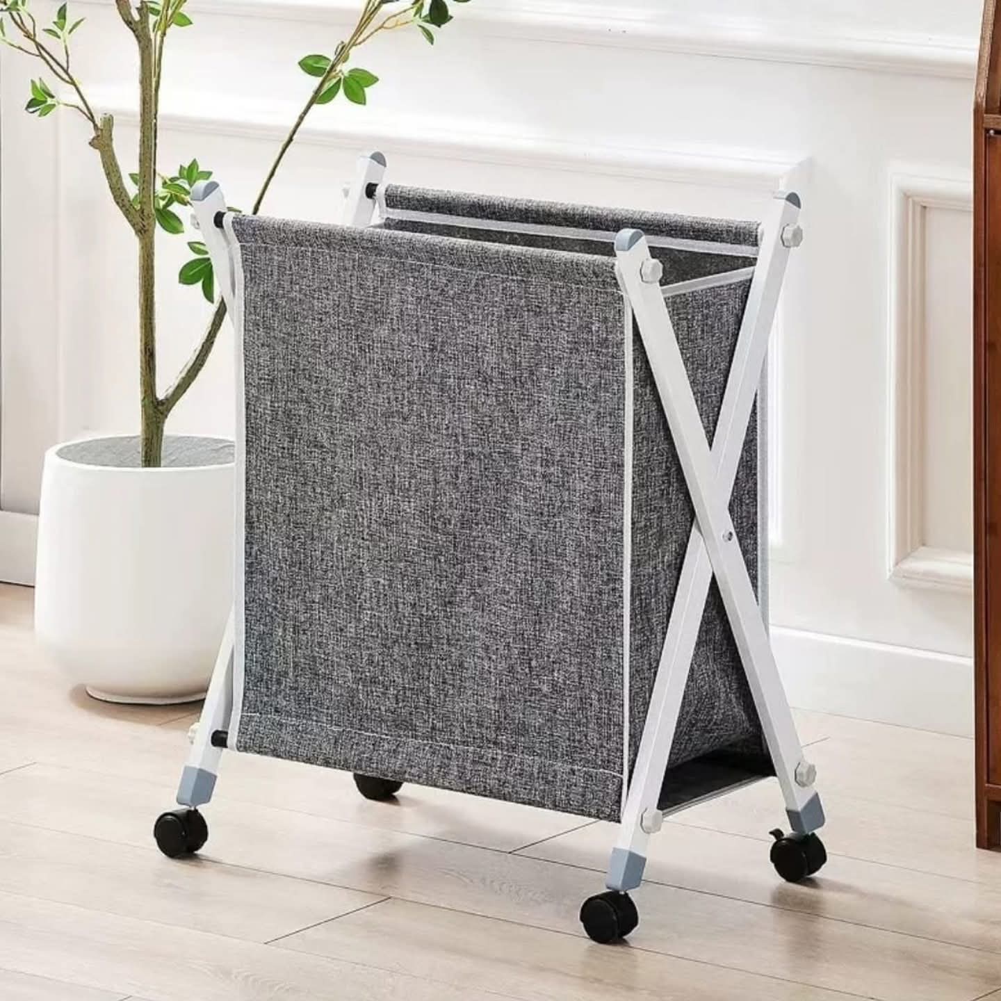 Folding laundry basket with wheels