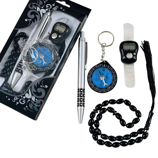 A 4-in-1 Tasbih gift set containing a silver pen, black prayer beads, a digital finger counter watch, and a blue compass key chain, all packaged and displayed.