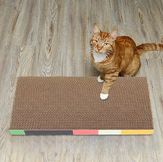 A brown cardboard cat scratching board with color accents