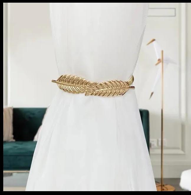 Spring curtain tie-back