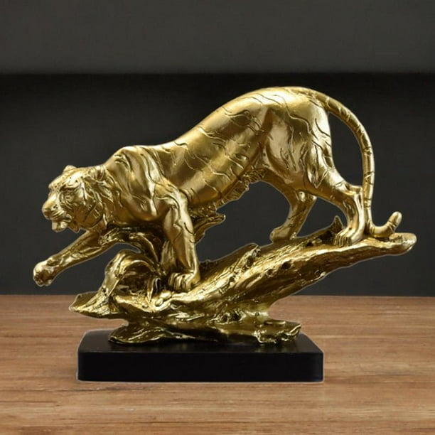 Gold tiger statue on a black base 