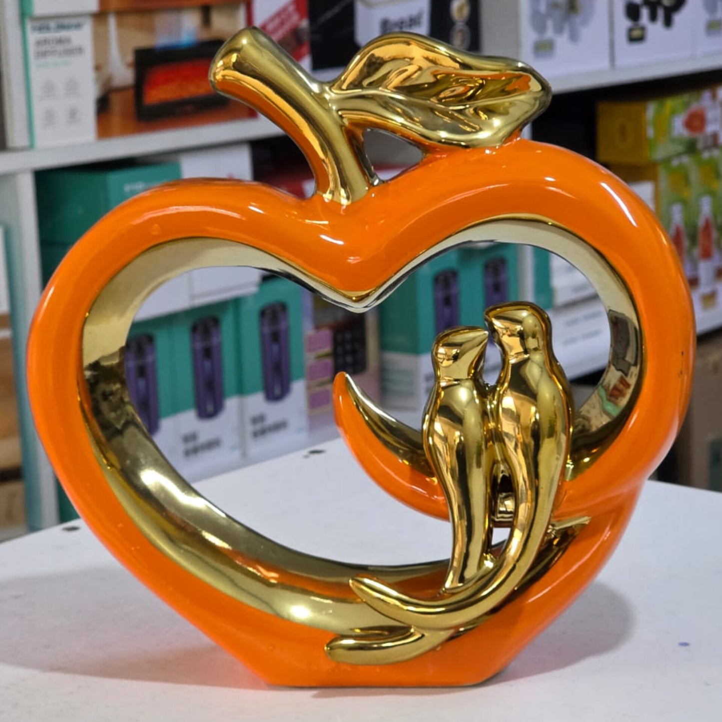 Ceramic hollow crafts Apple golden bird simulation