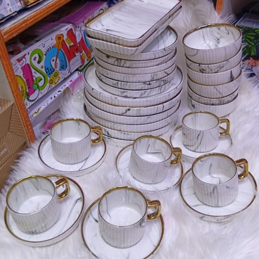 32 Piece  Porcelain Dinner Set with Gold Trim