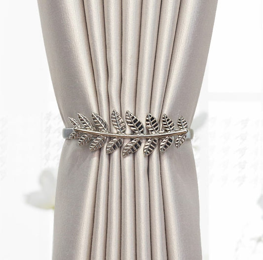 Spring curtain tie-back