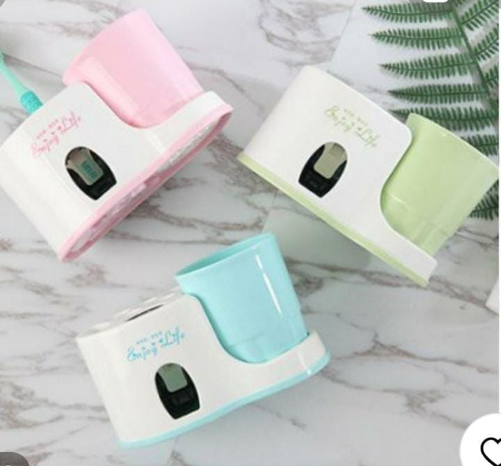 Toothbrush holder with dispenser