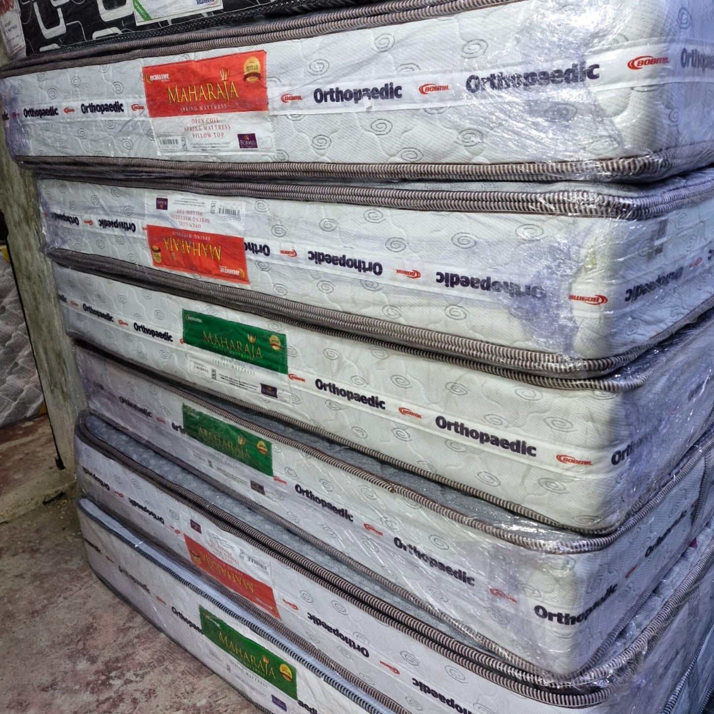 Orthopedic mattress with spring