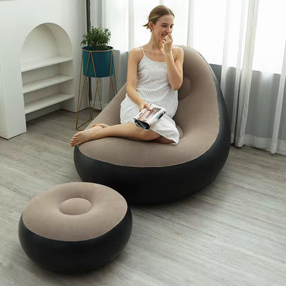 Inflatable sofa with foot rest