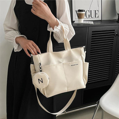Cross body tote bag with round coin purse