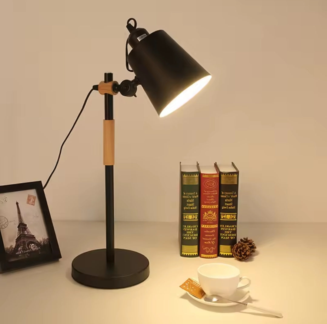 Black metal and natural wood desk lamp with an adjustable black shadefor study and bedside 