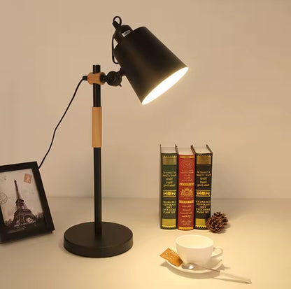 Black metal and natural wood desk lamp with an adjustable black shadefor study and bedside 
