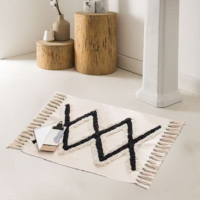 Bohemian bedroom rug with tassels