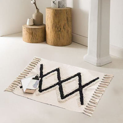 Bohemian bedroom rug with tassels