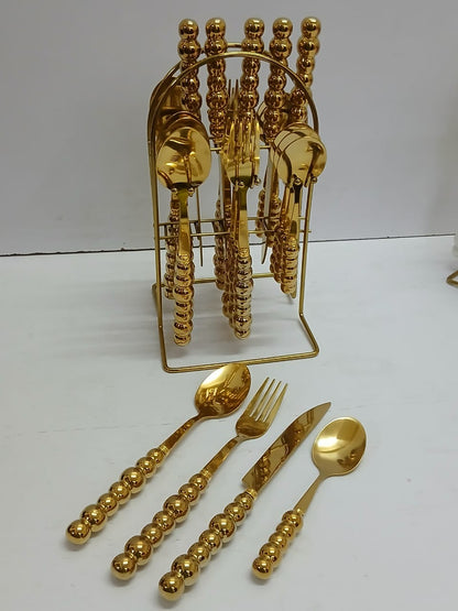 24 Pc  gold cutlery set with stand