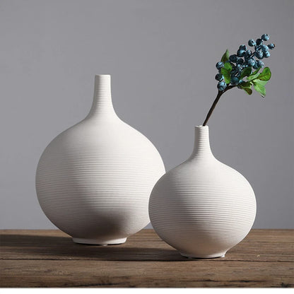 Round white flower vase