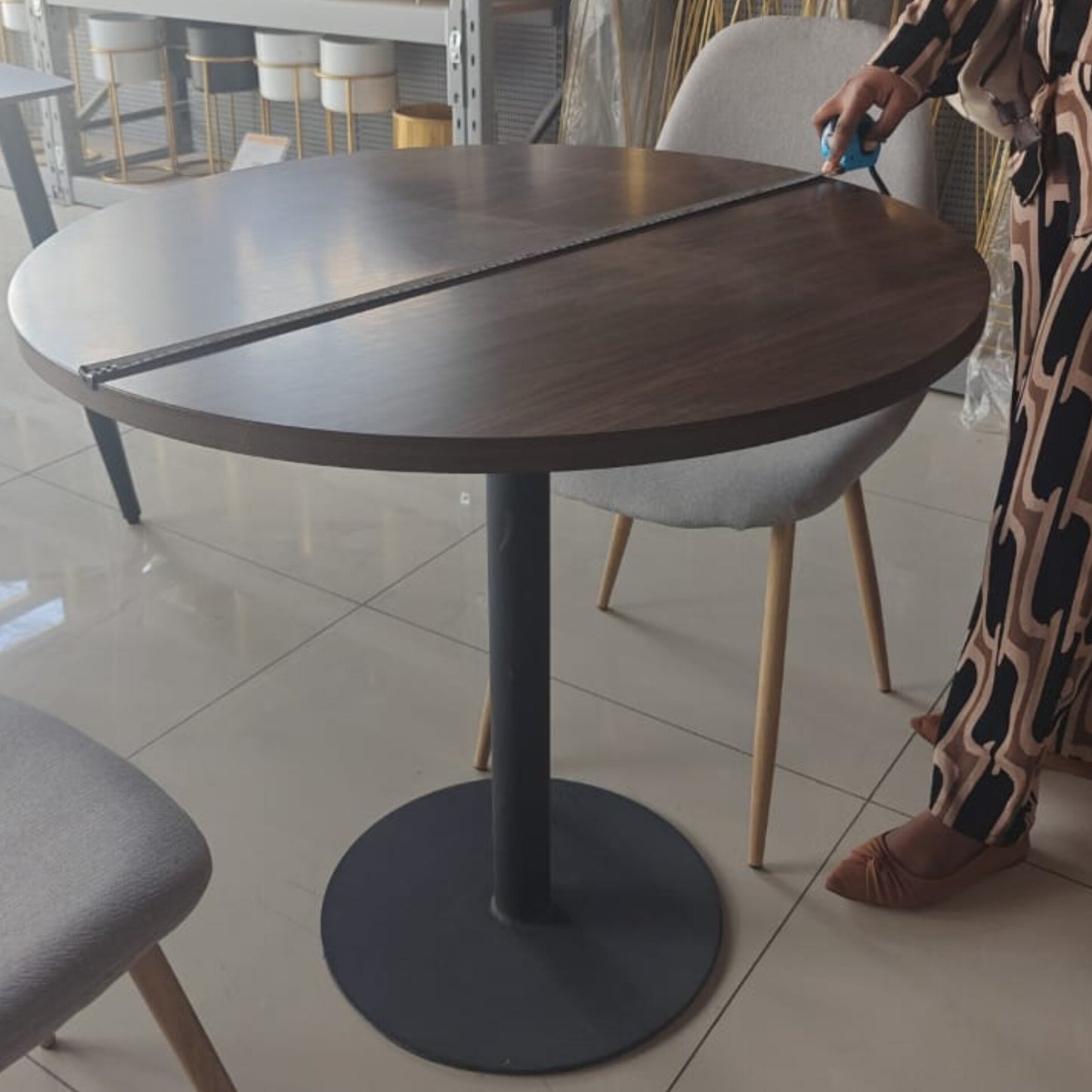 Round Wooden side table with coated metallic pedestal base