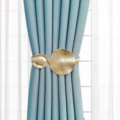Spring curtain tie-back