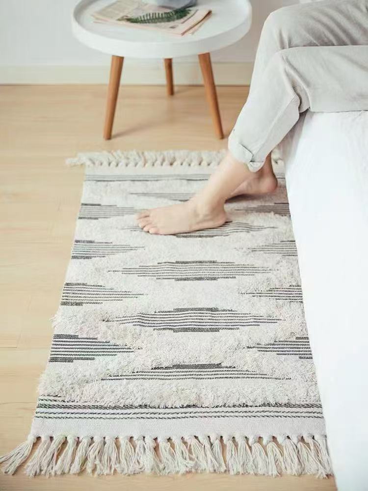 Bohemian bedroom rug with tassels