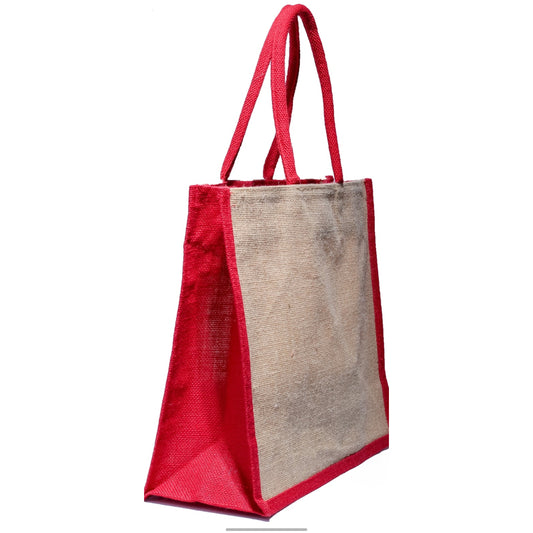 A large, natural tan jute tote bag with bright red trim and matching red webbed handles, shown on a white background.