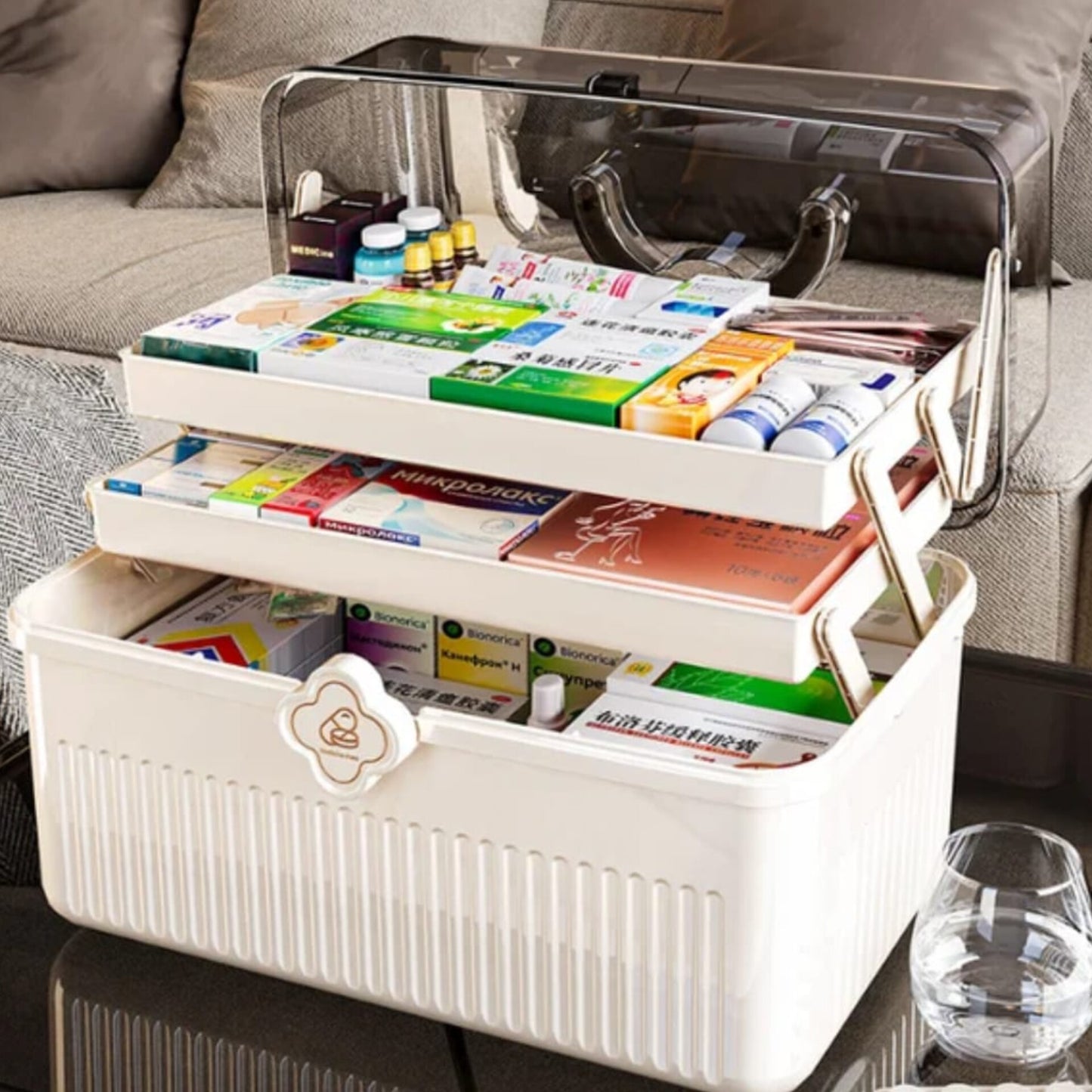 Three layer portable medicine pill box with transparent lid and unfolded trays