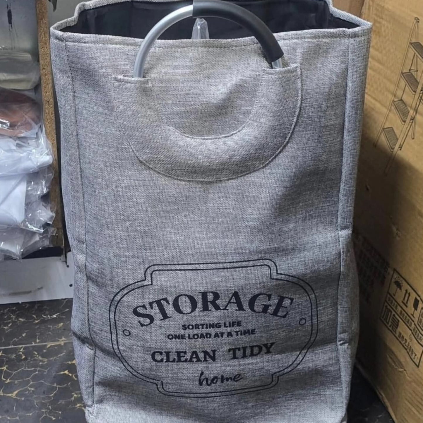 Laundry basket with movable wheels