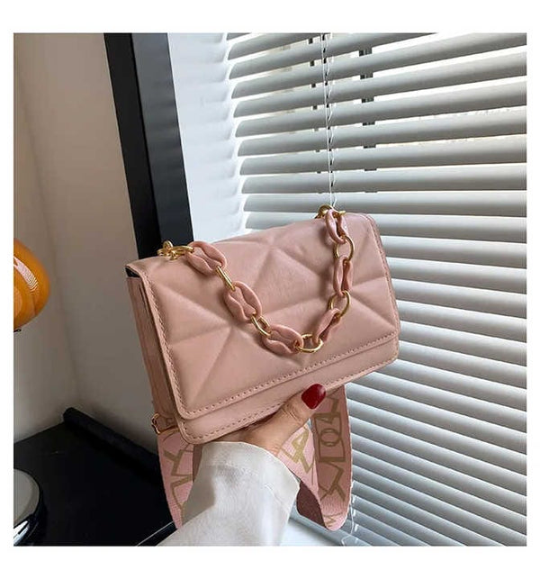 Embossed sling bag