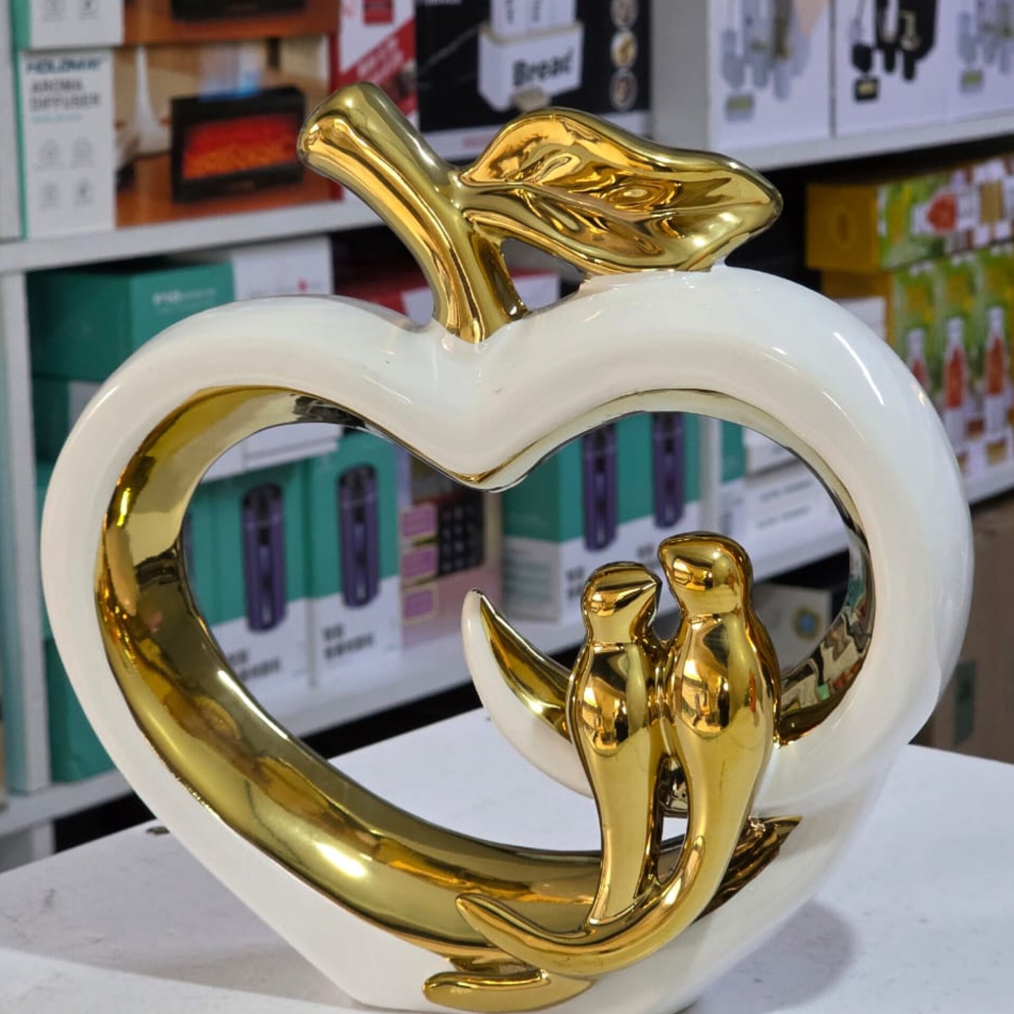 Ceramic hollow crafts Apple golden bird simulation