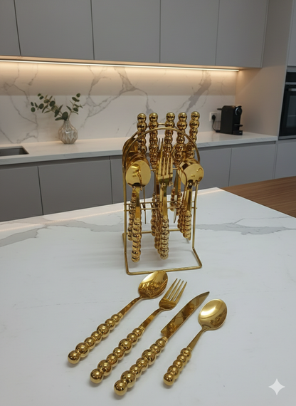 24 Pc  gold cutlery set with stand