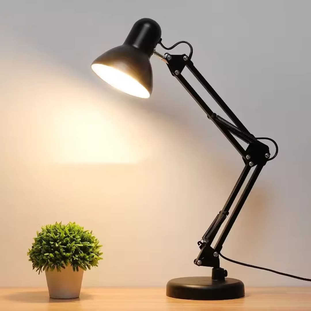 360° Adjustable Round Base Style Desk Lamp
Perfect for reading, study tables, nail/beauty salons & work desks.
Strong lighting • Flexible arm • Durable metal design.
Uses a normal screw bulb (E27). 
