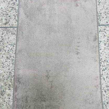Absorbent bathroom door mat