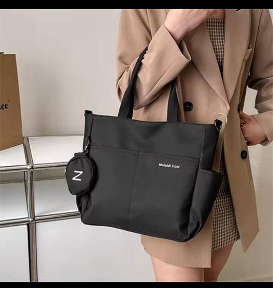 Cross body tote bag with round coin purse