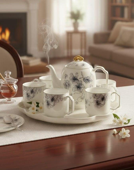 Elegant Porcelain Tea Set with Blossom Motif and Serving Tray