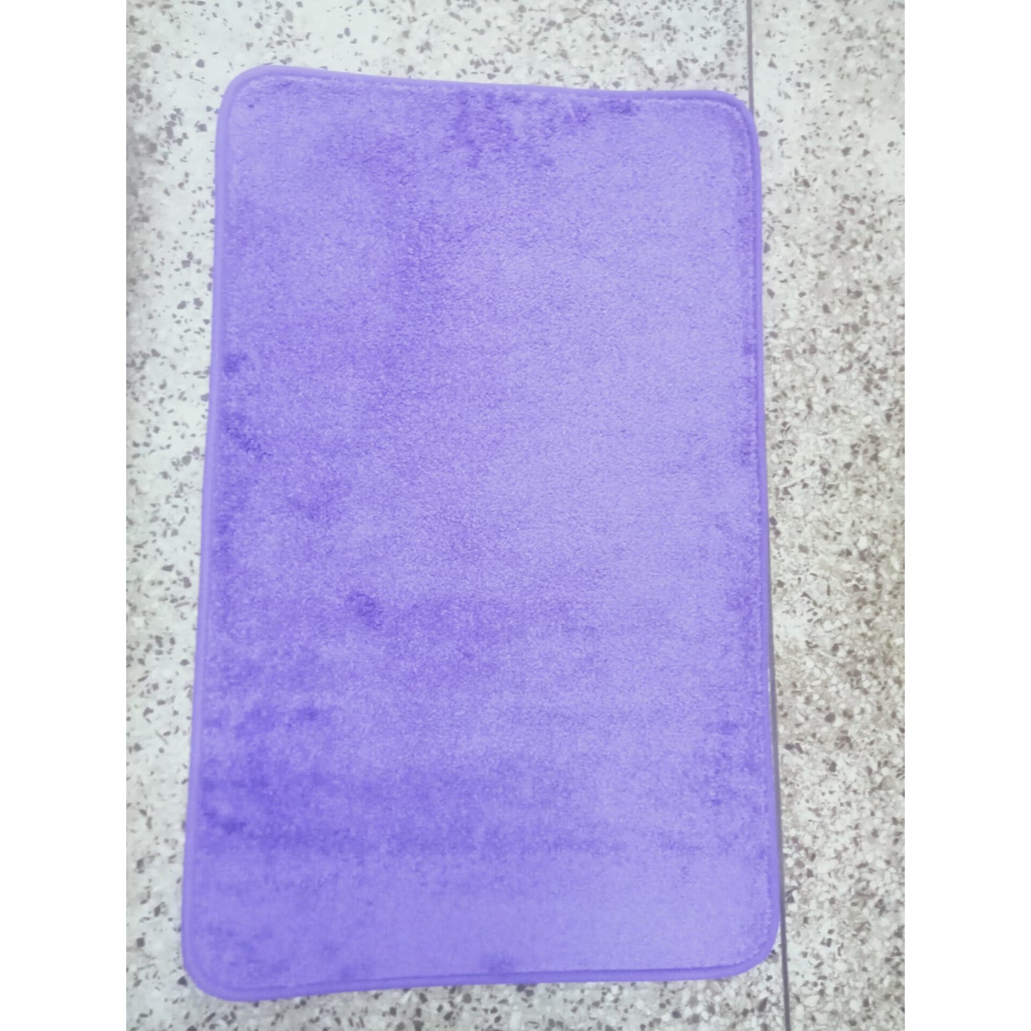 Absorbent bathroom door mat