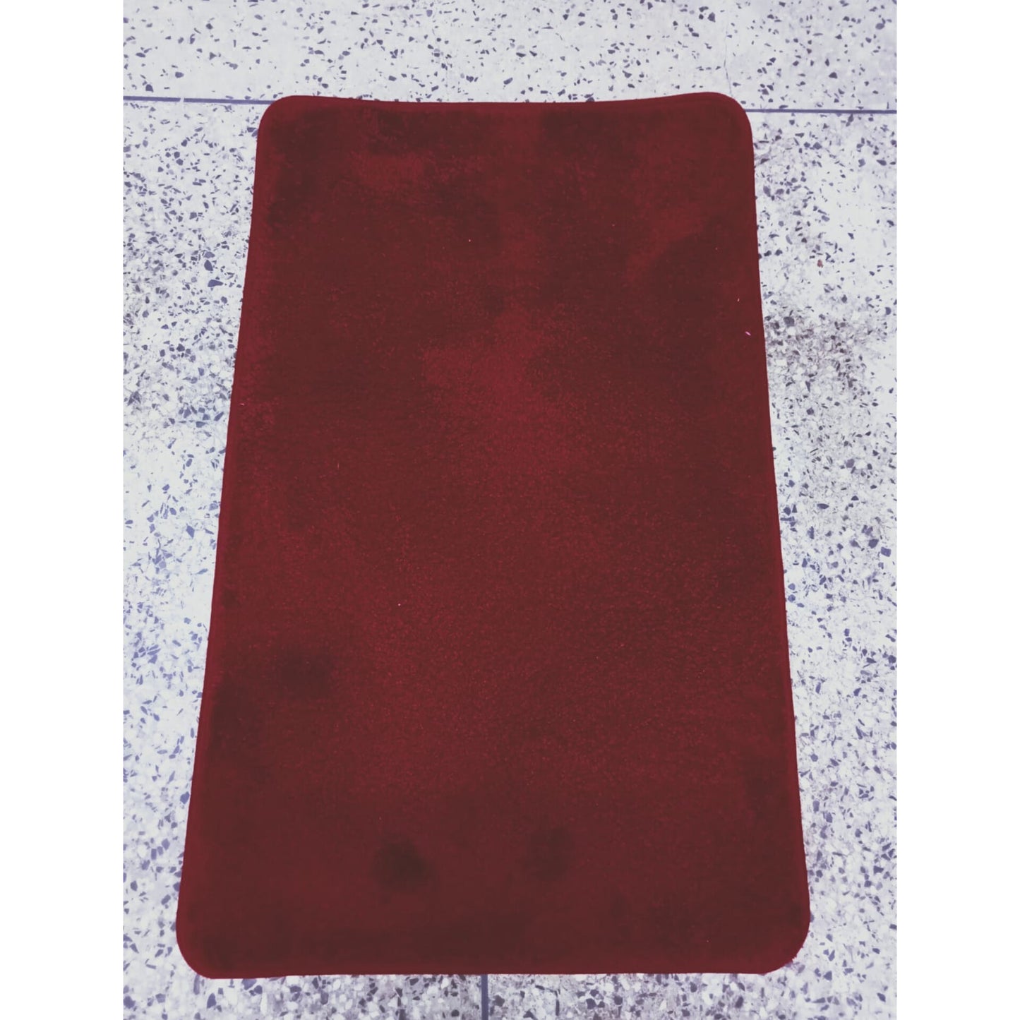 Absorbent bathroom door mat