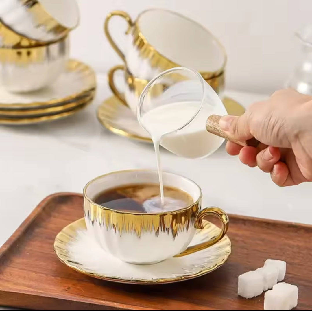 Porcelain 12pc tea set cups and saucers