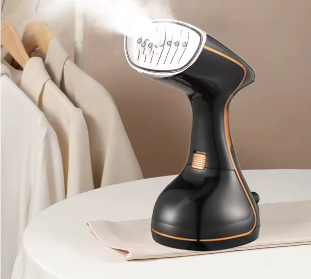 Handheld garment steamer