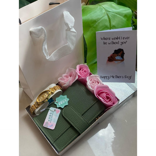 Mother's Day gift set with green purse, gold watch, and pink rose soaps in a box.
