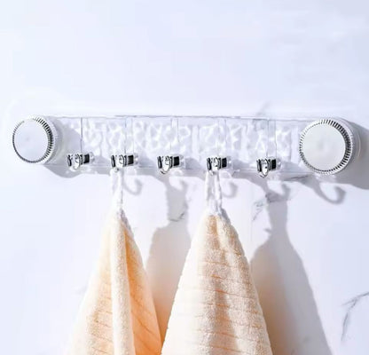 Multipurpose rotating suction cup hook