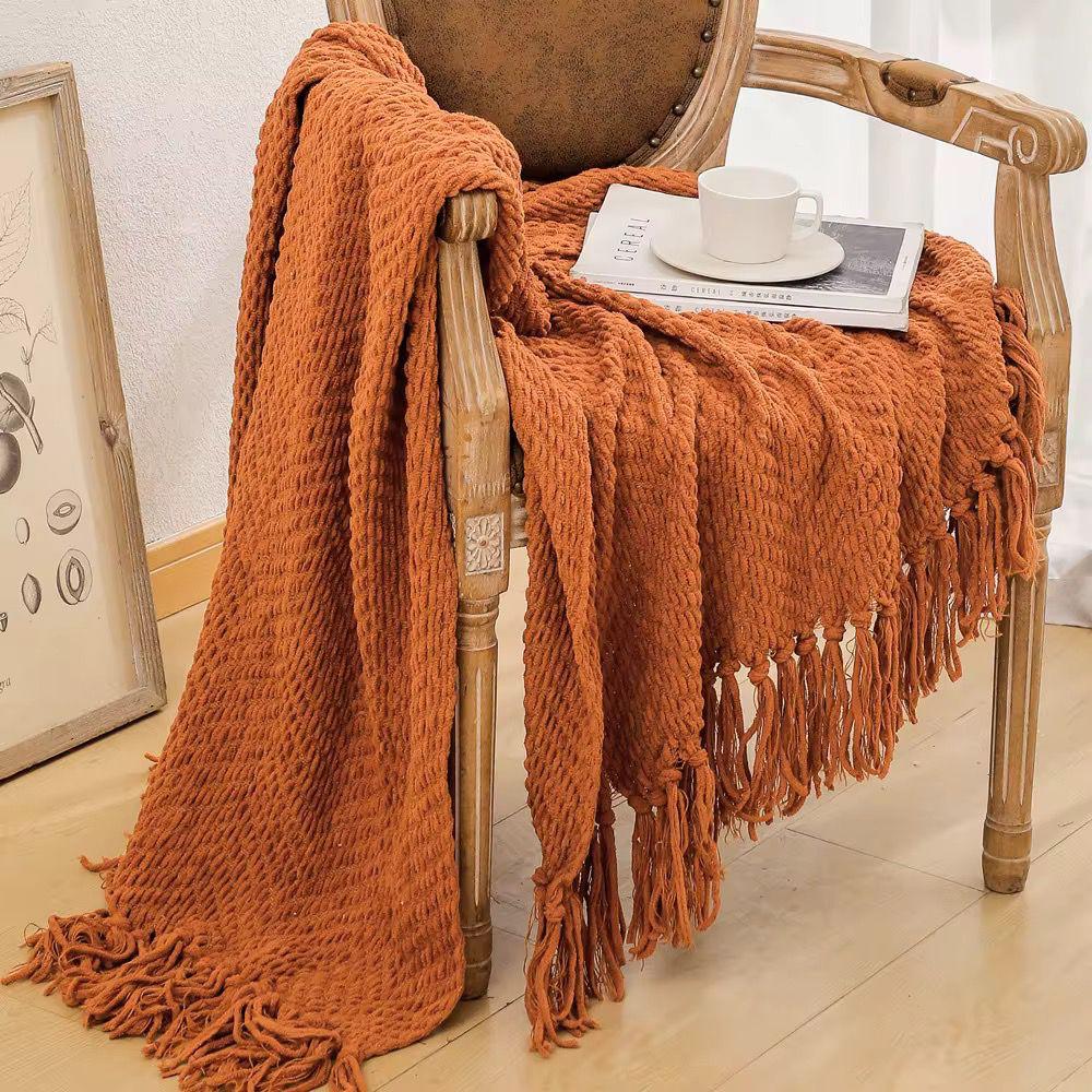 Textured knit throw blanket with tassels
