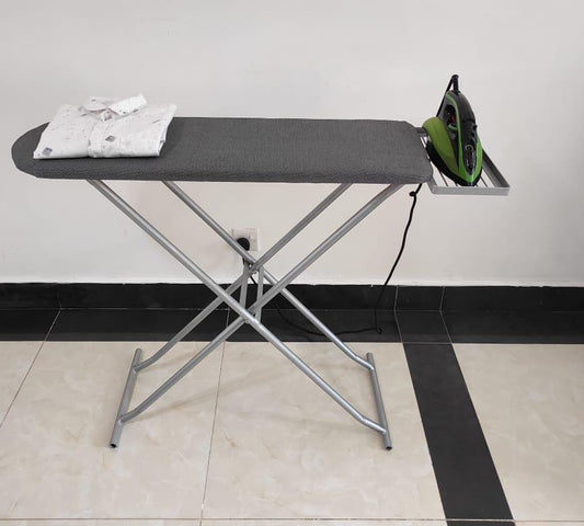 Gray ironing board with a silver metallic frame.
