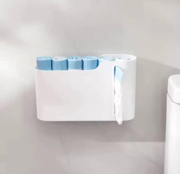 Wall mounted garbage bag dispenser