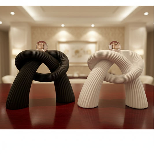 Ceramic knot sculpture with glass spheres on