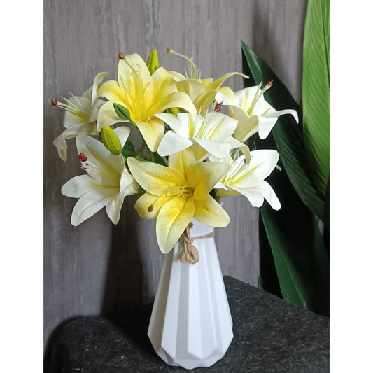 Tiger lilies with plastic vase