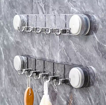 Multipurpose rotating suction cup hook
