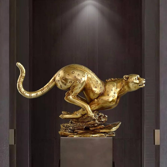 Gold panther statue,Golden resin sculpture of a cheetah running over a rock base