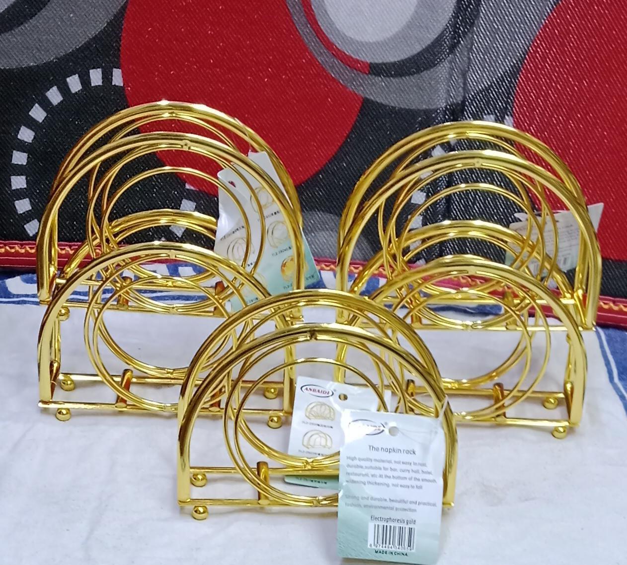 Metallic serviette holder