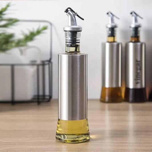 Glass oil bottle with steel cover