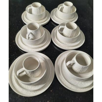 Twenty four piece textured ceramic dinnerware set
