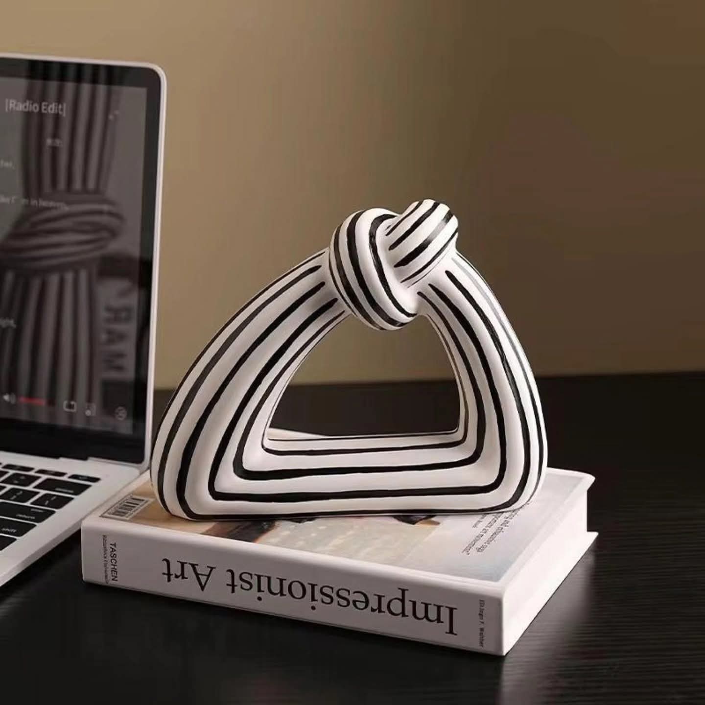Abstract striped knot sculpture